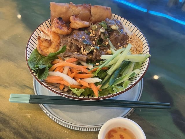 Vermicelli Noodles with Pork and Spring Roll.